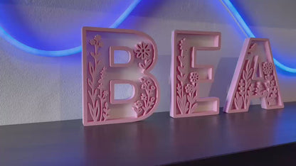 Nome 3D floreale rosa composto - video - Livoncraft3D